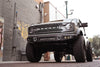 OE plus Series Front Bumper Compatible with Ford Bronco 2021-2023 | Multiple Light Mounts | Compatible with OEM Skid Plate, 360° Camera, & Sensors | Reinforced D-Ring Mounts |