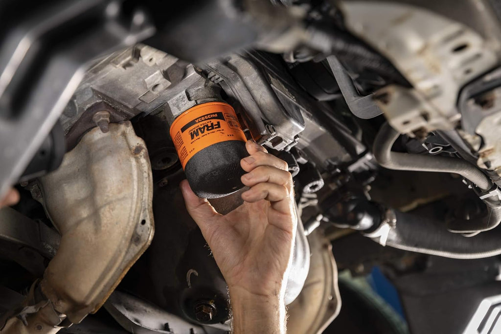FRAM Extra Guard PH4967 10K Mile Change Automotive Replacement Interval Spin-On Engine Oil Filter for Select Vehicle Model Years, Vehicle Engine Protection Oil Filter for Everyday Drivers