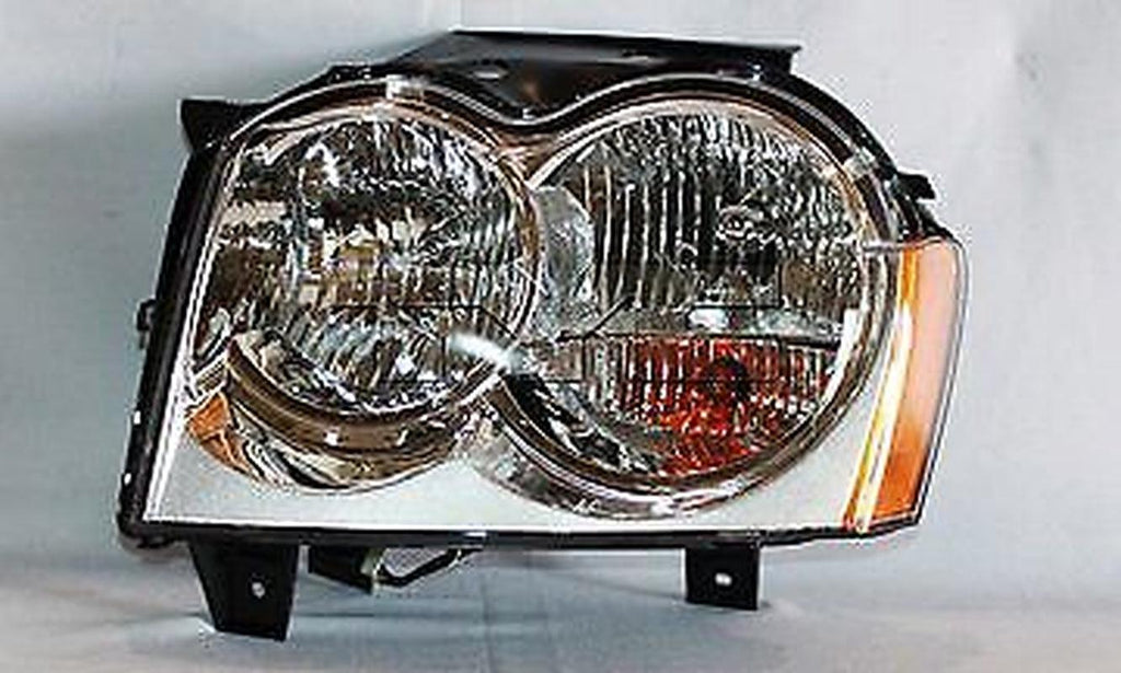 TYC Headlight Assembly for 05-07 Grand Cherokee 20-6590-00